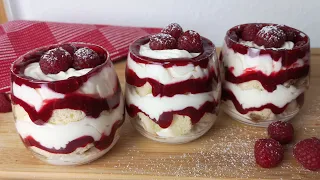 The trifle is crimson. Dessert in cups: vanilla sponge cake, cottage cheese cream, raspberry confit.