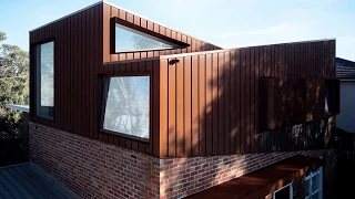 Brick Home from the 50’s in Melbourne with a Corten Second Floor Addition