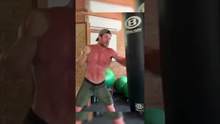 Chris Hemsworth working out shirtless