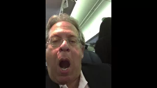 Listen as passenger screams in the face of screaming kid...