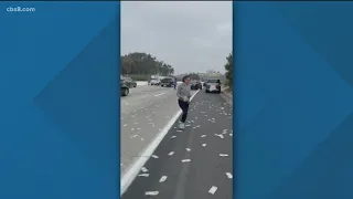 Cash on San Diego freeway | Traffic incident with armored vehicle causes chaos on Interstate 5