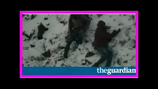 Footage shows dramatic rescue of climbers stuck on a ridge in Snowdonia – video