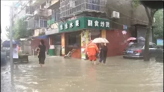 Heavy Rain Triggers Flood, Disrupts Traffic in East China City