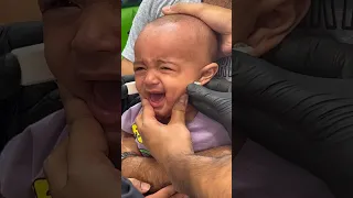 My 9 months old got her ears pierced and the reaction was shocking 😓 #shorts #viral #earpiercing