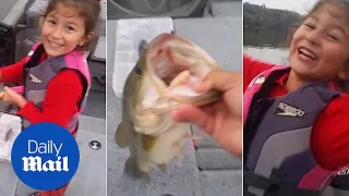 You got it! CUTEST reaction when a girl catches a bass fish - Daily Mail