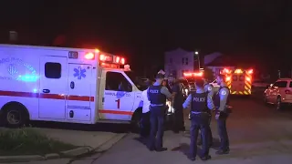 3 shot while standing on sidewalk in Back of the Yards