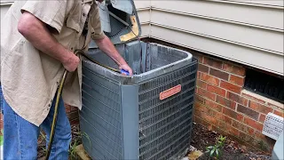 Cleaning a Goodman Air Conditioner junky leaker