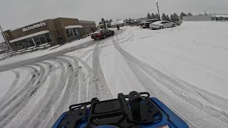 Riding my new 4 wheeler to Mcdonald's in the snow!