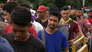 Venezuelans cross Colombia border in search of new life