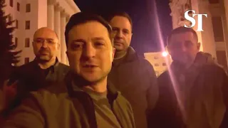 'We are here' -defiant Zelensky on the streets of Kyiv