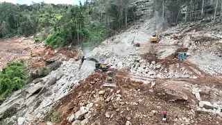 New Update 95% High Mountain Road Construction Excavator Digging Stone On Mountain