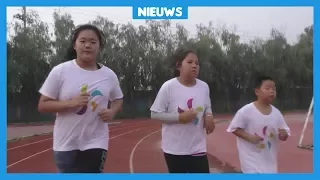 Te dikke kinderen in China moeten op afvalkamp