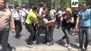 POLICE AND PROTESTERS CLASH IN BAKU