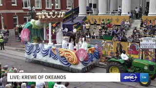 Queen of Krewe of Okeanos and her maids toast at Gallier Hall