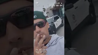 Filipe Ret fumando um na frente da polícia