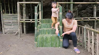 Girl builds bamboo stairs up to the house - single mother