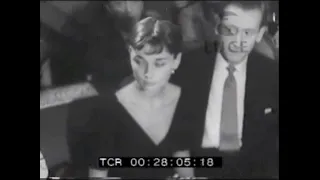 1952 Audrey Hepburn and James Hanson attending fashion show in Rome