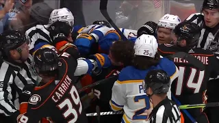 Peyton Krebs bumps John Gibson causing scrum