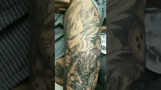 Black and grey Magin vegeta anime tattoo on thigh