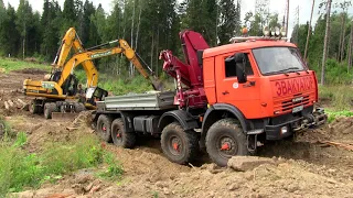 Грузовой эвакуатор. Вытаскивание экскаватора