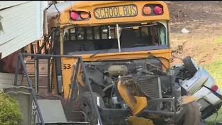 7 kids hurt when school bus crashes into house in NY suburb