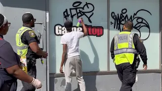 doing graffiti in front of weak cops prank!