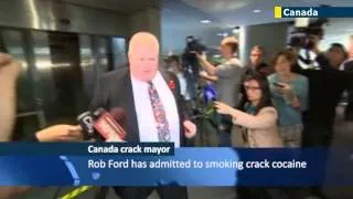 Crack cocaine smoking Toronto Mayor Rob Ford stripped of powers but still refuses to resign