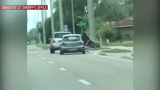 Video shows road rage incident in Sarasota, driver intentionally rams motorcyclist off road