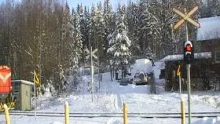 Finnish freight train 3356 passed Tiituspohja II level crossing