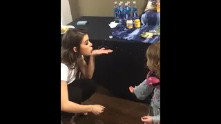 hailee steinfeld with a kid after her concert