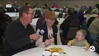 Dave Rexroth talks to family at fish fry