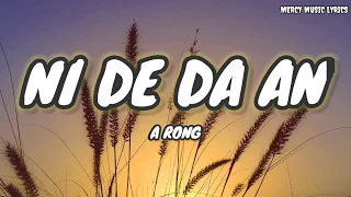 Ni De Da An - A Rong (Lyrics Pinyin , Terjemahan Indonesia)