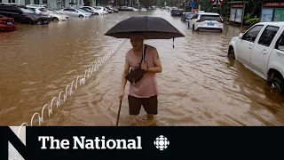 Typhoon dumps summer's worth of rain in one day in Beijing