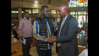 Standing with Amos Kimunya during the Requiem Mass of his late wife Lucy Wanjiru, Consolata Shrine