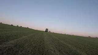 John Deere 864 baling