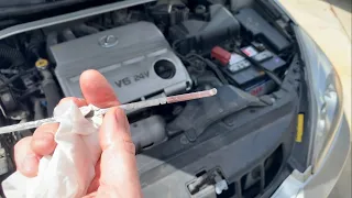 How to check the transmission fluid level on a Lexus ES300 car.￼