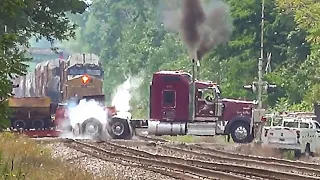 Semi truck stuck on train tracks with train coming || The truck got stuck on the railway tracks