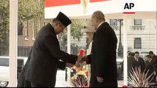 Indonesia's president meets Queen Elizabeth II during a visit to Britain