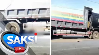 Rider na sumalpok sa kotse, tumilapon at nagulungan pa ng truck | Saksi