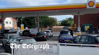 Queues form at petrol stations as drivers urged not to panic buy