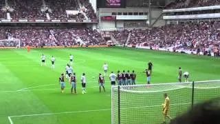 West Ham fan invades pitch and takes free kick