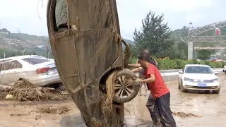 Heavy rain triggers mountain floods in Shanxi Province