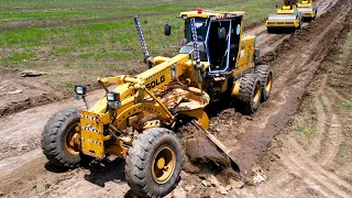 SDLG G9190 Motor Grader and Road Roller Compactor Installation Road in The Field.