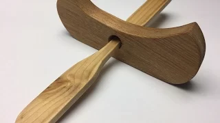 Impossible paddle through canoe trick