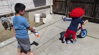 omg scary clown riding the bike! who is this small clown! scary!