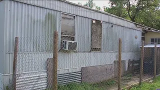 Woman rescued after being locked in trailer for nearly 4 years