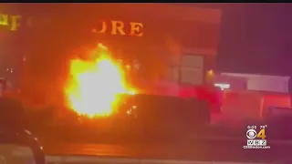 Man pulls woman, child from burning car in Revere