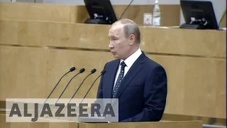 Putin calls for stronger Russia at parliament opening