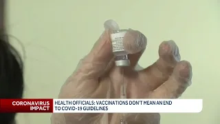 Vaccinations don't mean end to COVID-19 guidelines, experts say