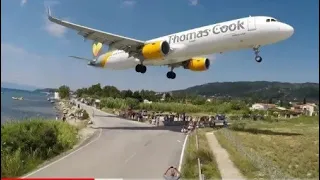 SKIATHOS   LOW LANDINGS   MAN USES JETBLAST for a KICKSTART on his MOPED480P